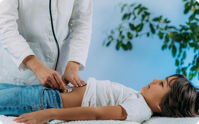 Child undergoing pediatric gastroenterology treatment