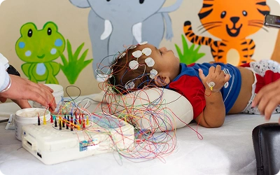 Child undergoing pediatric neurology care